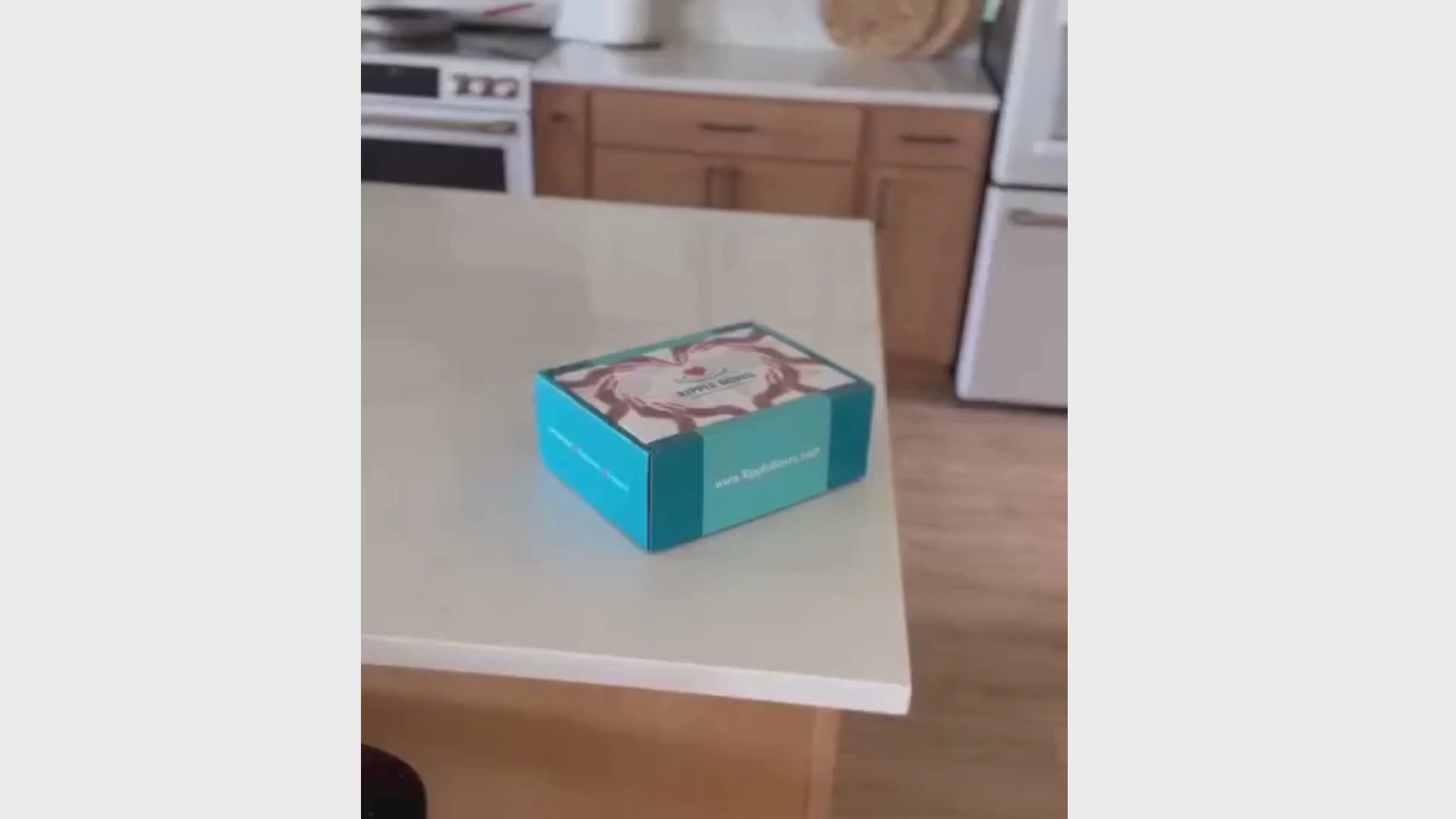 Load video: A customer opening their Ripple Box.